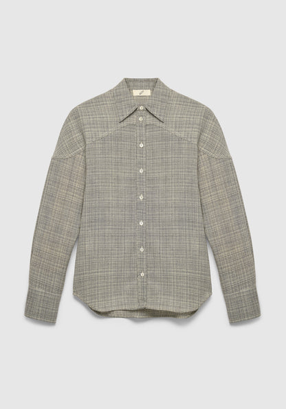 A long-sleeve button-up shirt in a textured gray fabric with a subtle woven pattern, featuring a pointed collar and a relaxed fit, displayed against a plain background.
