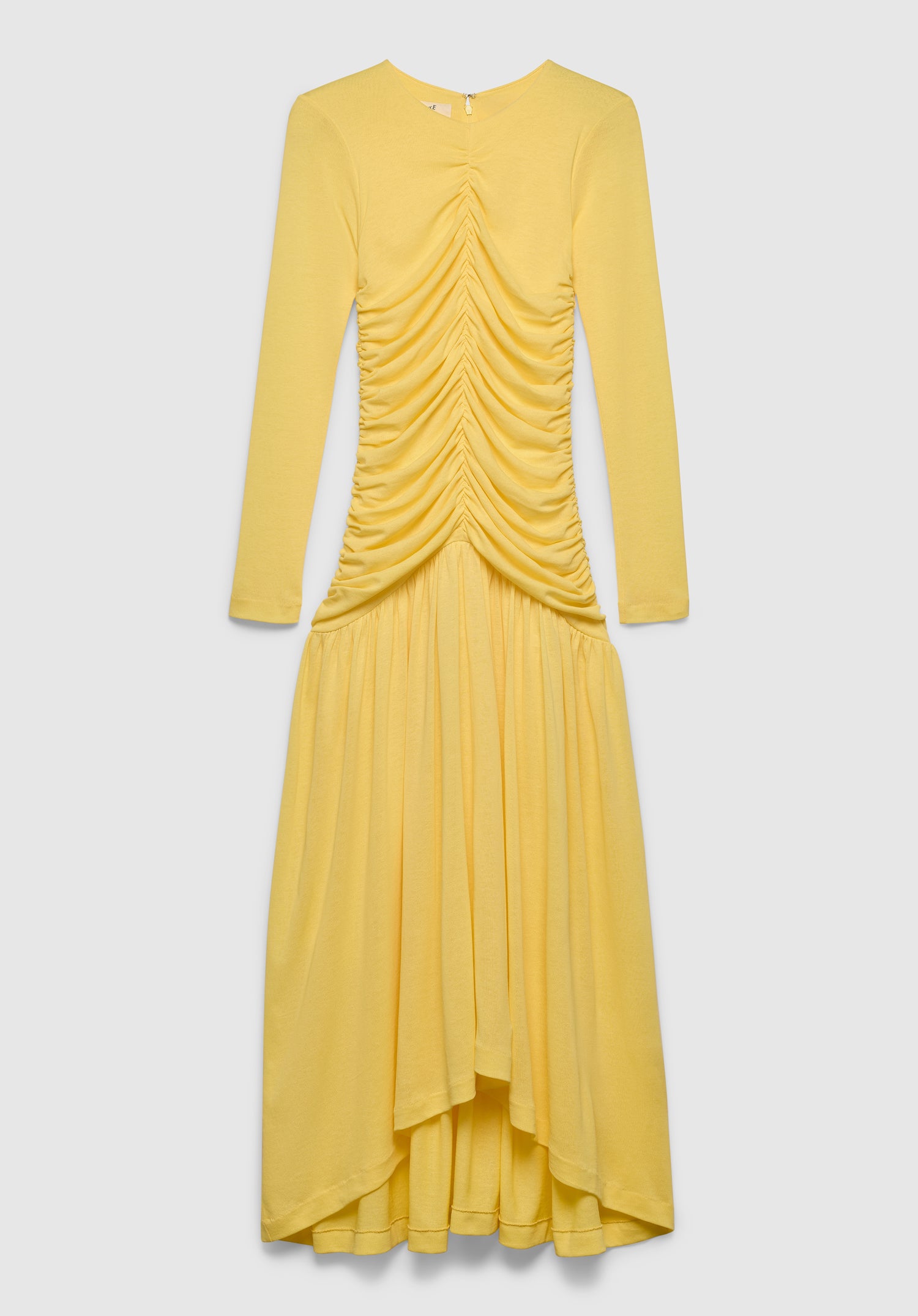A yellow long-sleeve maxi dress with a fitted bodice, featuring ruched detailing down the front and a flowing, asymmetrical skirt, displayed against a plain background.
