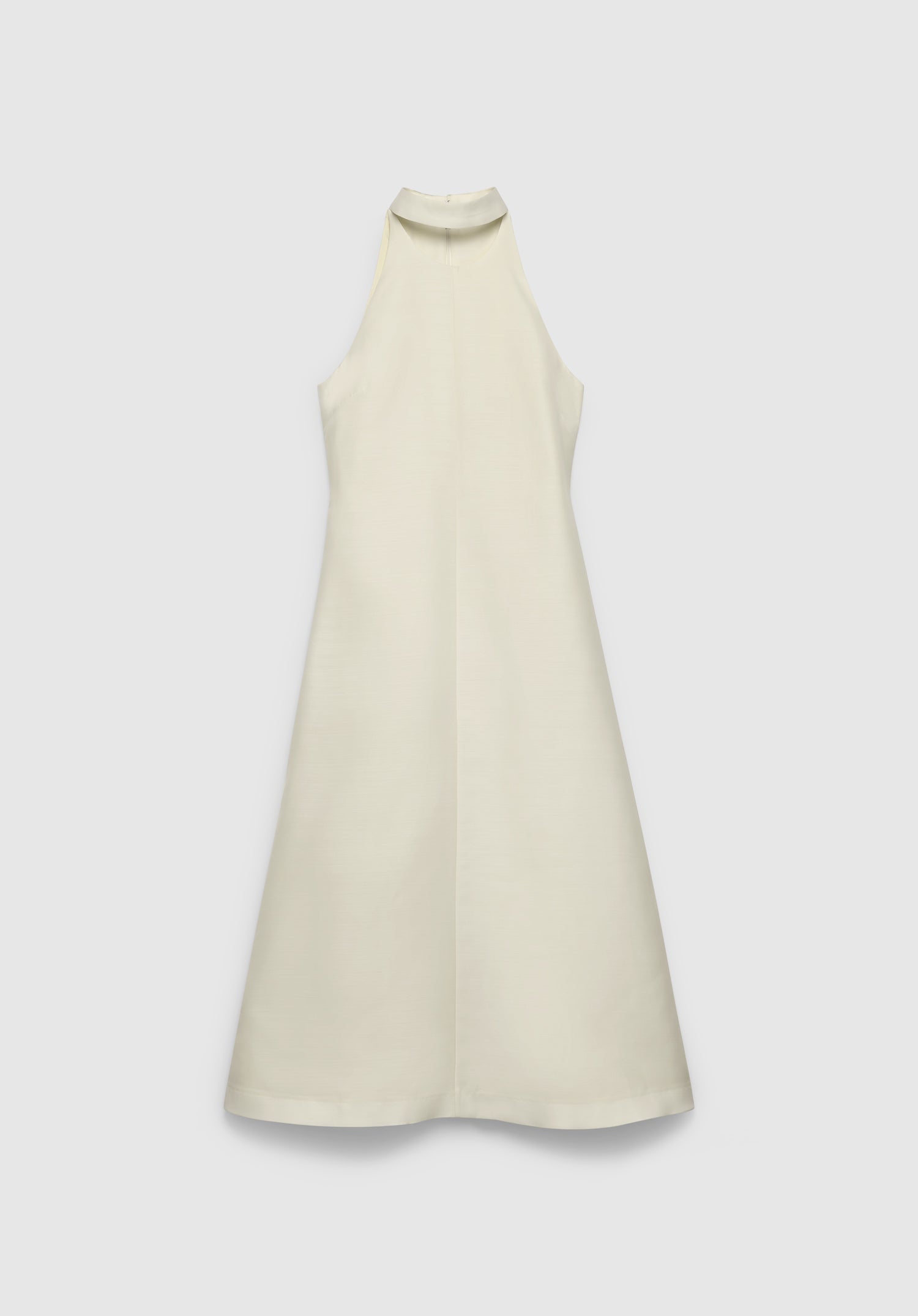 A cream-colored sleeveless midi dress with a high neckline and an A-line silhouette, featuring a clean, minimal design, displayed against a plain background.
