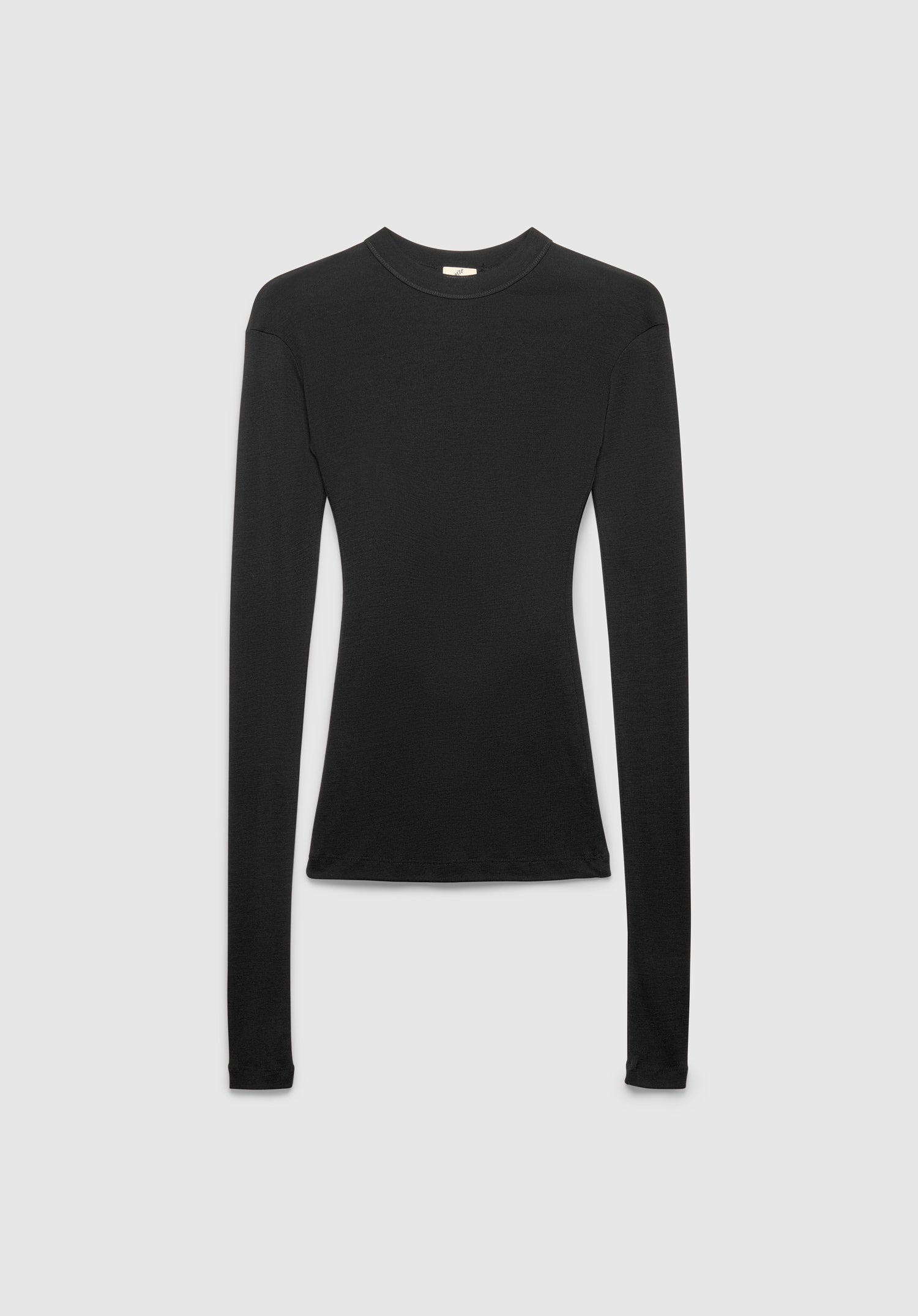 A fitted black long-sleeve top with a crew neckline, featuring a sleek, minimal design and a close-to-body silhouette, displayed against a plain background.
