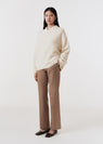 Asymmetric v-neck merino sweater off white