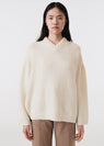 Asymmetric v-neck merino sweater off white